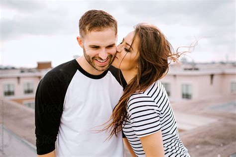 woman and man kissing|A Man Kissing a Woman .